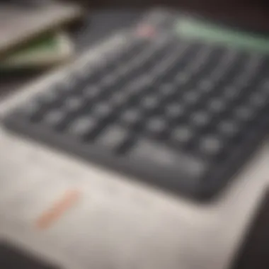 A close-up of a calculator and financial documents