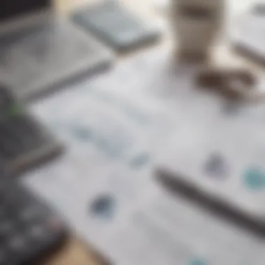 A close-up of a financial planner's desk with charts, calculators, and documents symbolizing budgeting.