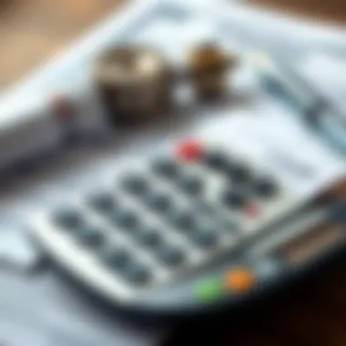Calculator with financial documents representing closing costs